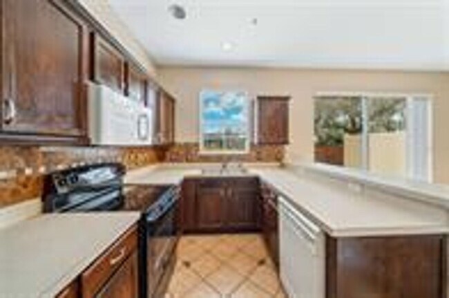 Building Photo - Luxury Lake Nona Townhome in Gated Community | 3BR + Garage + Resort-Style Amenities