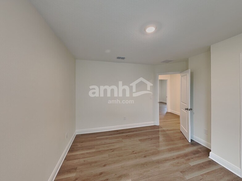 Building Photo - 5980 Pinewood Ests Dr