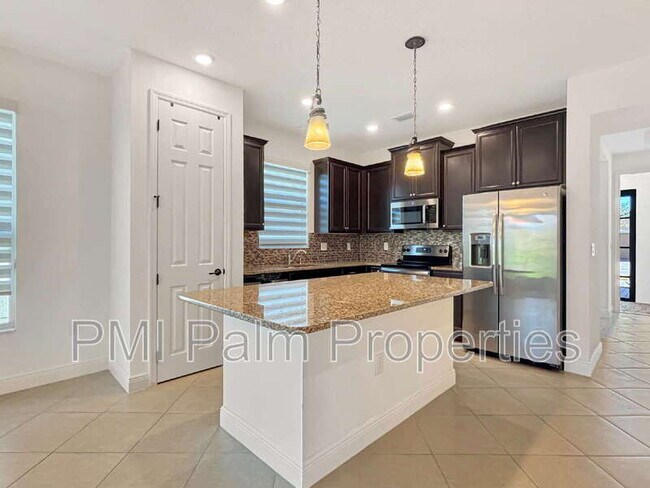 Building Photo - 9870 SW Trumpet Tree Cir