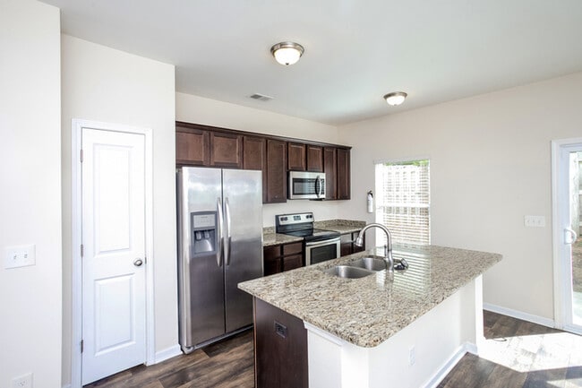 Building Photo - 1 Month Free! Tour Today! Spacious Home Ne...