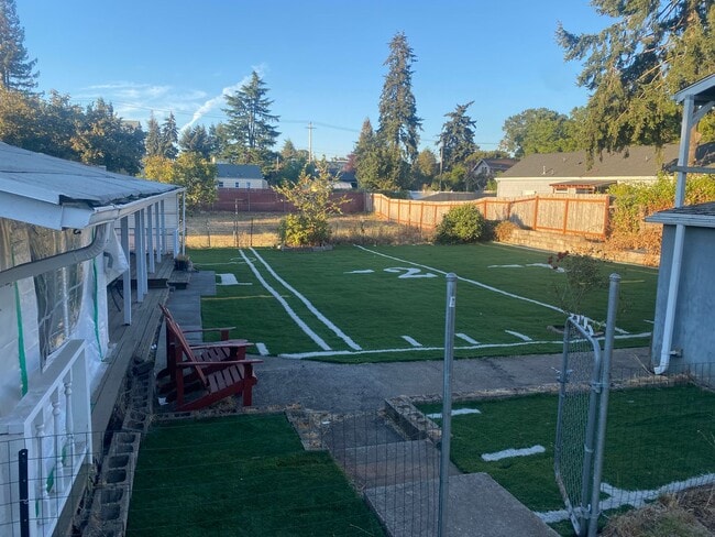 Building Photo - Cozy Single family home with two car garage and controlled access gate
