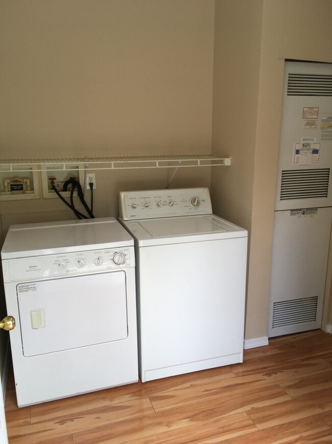 Laundry Room with washer, gas dryer and furnace - 13210 Wagon Wheel