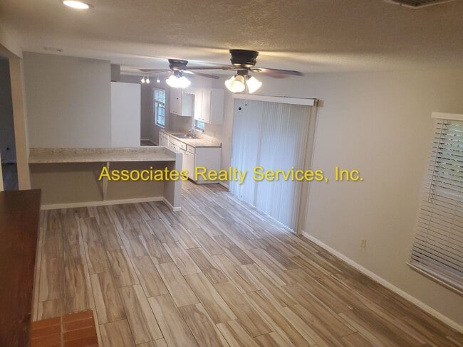 Building Photo - Three bedroom, two bath - 1720 Sq. ft., Acre lot