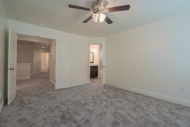 Building Photo - Modern 4-Bed Stand-Alone Home with Fenced Patio