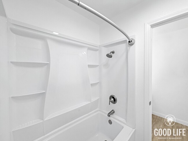 Building Photo - Bright, Newly Renovated 2BR in Peaceful UTC Community