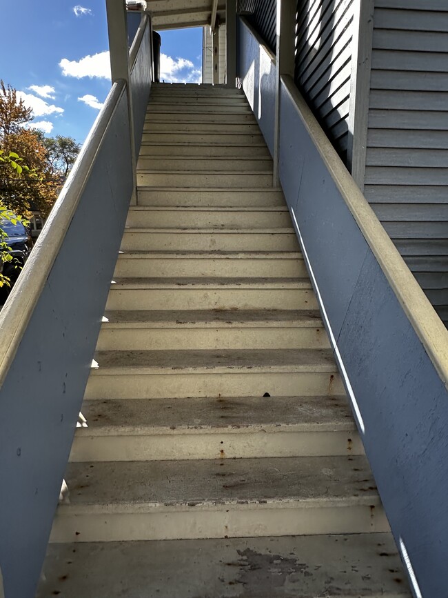 Stairs to apartment - 1126 68th St