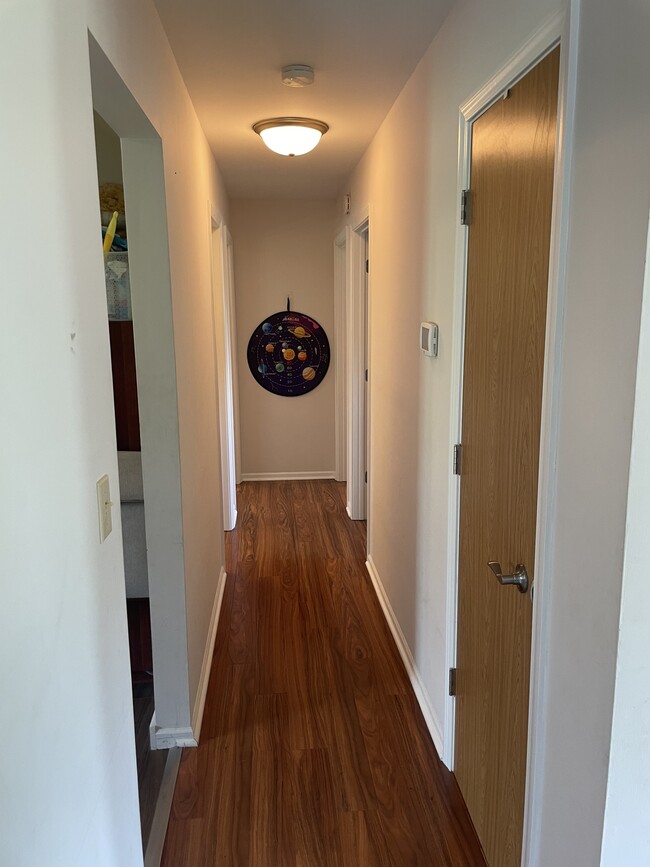 hallway to all rooms for easy/convenient one level living - 8231 E Superior St