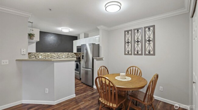 Building Photo - Great location, quiet first floor end unit...