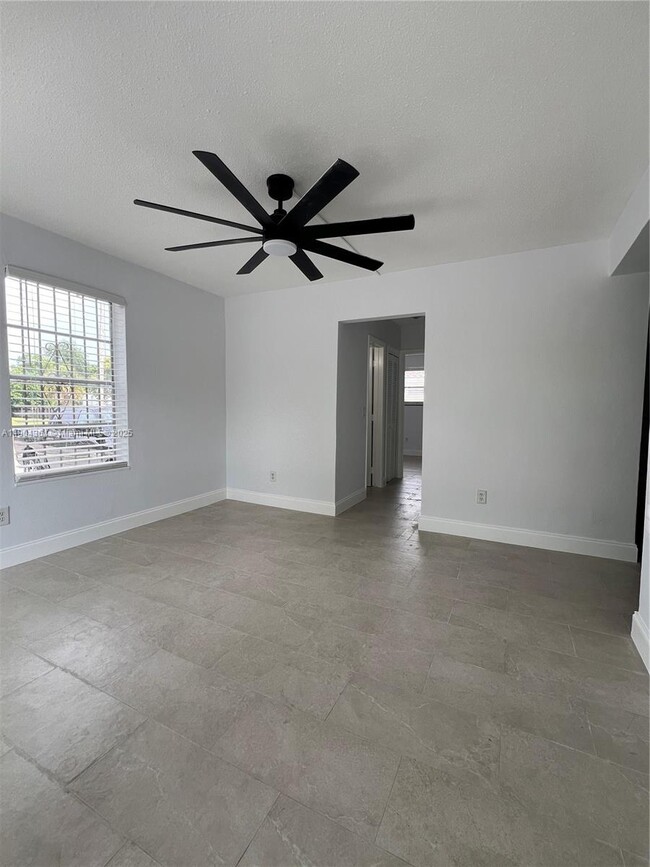 Building Photo - 5990 NE 4th Ct