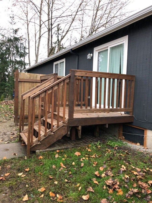 Fully fenced backyard is great for BBQs/pets - 219 E 36th St