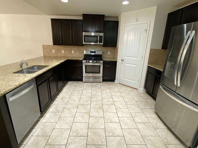 Building Photo - Spacious 4-Bedroom Home with Washer & Dryer Included in Riposa Vita Community!
