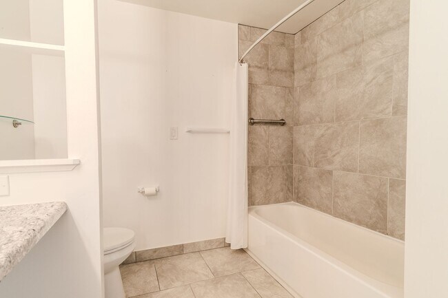 Building Photo - Move-In Ready Fox Hills Condo with In-Unit Laundry & Assigned Carport