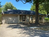 Building Photo - Three bedroom, two bathroom, two car garag...