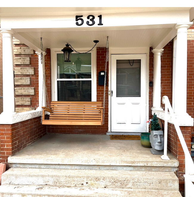 front porch - 531 N Logan St