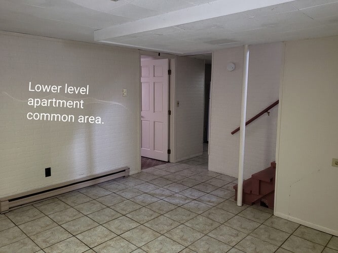 Lower level apartment common area - 1016 S Franklin St