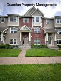 Building Photo - Pet Free Champlin Town Home, 3.5 Baths, 2 Car Garage, Dishwasher, Balcony, Available end of April