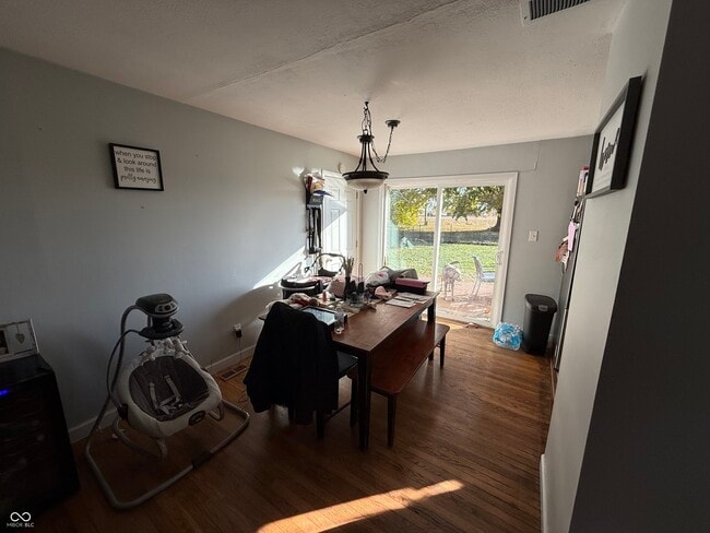 Building Photo - 8667 N Ricks Dr E