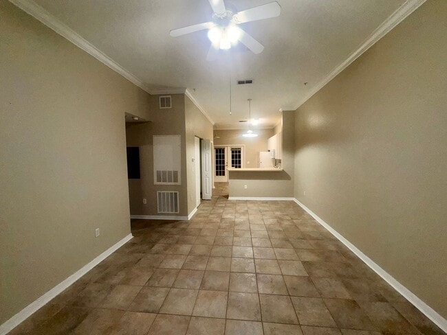 Building Photo - 2 Bedroom 2 Bath Corner Unit Ground Floor Condo Near UCF with Tile Flooring and Scenic View!