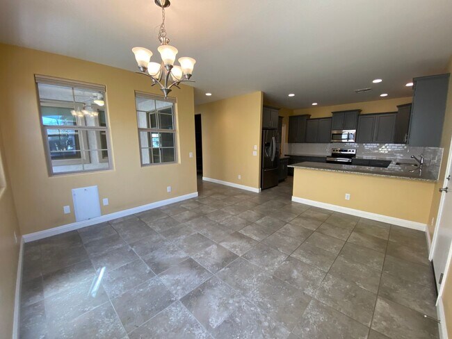 Building Photo - 3-Bed Home with Community Pool Access, Low-Maintenance Yard, and Upgraded Kitchen, Featuring Gran...