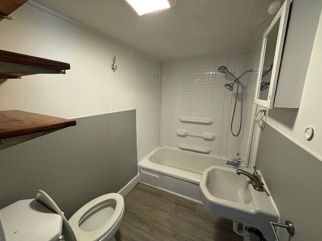 Building Photo - Studio Apartment includes washer / dryer