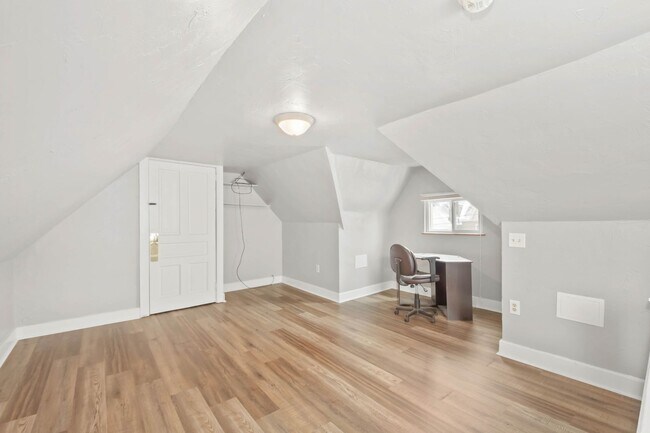 Building Photo - JUST LOWERED! EXPERIENCE THE ULTIMATE SAVI...