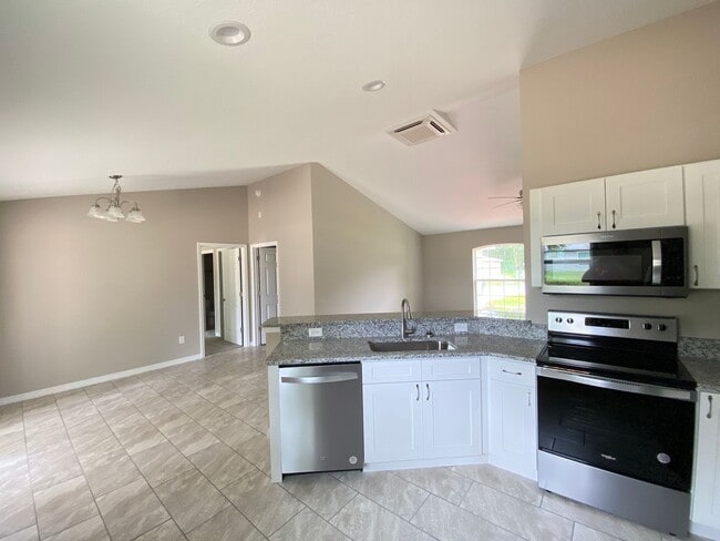 Building Photo - Limited Time Rent Reduction and NO applica...