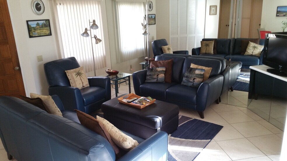 Living room with TV - 67151 N Chimayo Dr