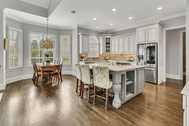 Building Photo - Fully Furnished 4 Bedroom, 3.5 Bath w/ 3 Car Garage and Unfinished Basement in Governors Club