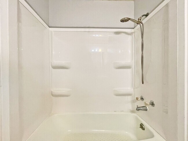 Building Photo - Spacious End-Unit Townhome with Fireplace, Family Room, 2-car Garage, Community Pool & Playground...