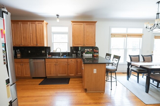 Building Photo - Spacious & Striking 3-story brick Executive 4 bedroom 4.5 bathroom home in Oak Ridge NC + Lawn ca...