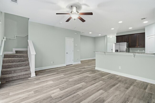 Building Photo - Charming 3 Bedroom Townhome with Private Patio & Fenced Backyard