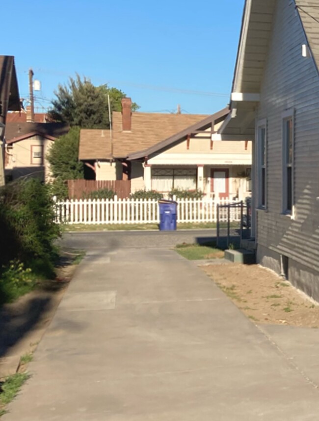 Driveway access to back unit home - 3036 Lemon St