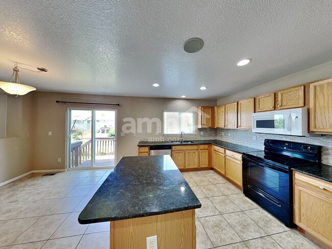 Building Photo - 5384 S Tibet St