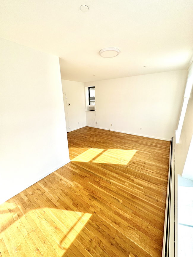 Living Room/Dining Room - 2322 Adam Clayton Powell Jr Blvd