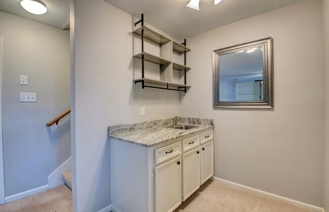 Building Photo - Welcome Home: Charming Brick Beauty with Covered Porch.