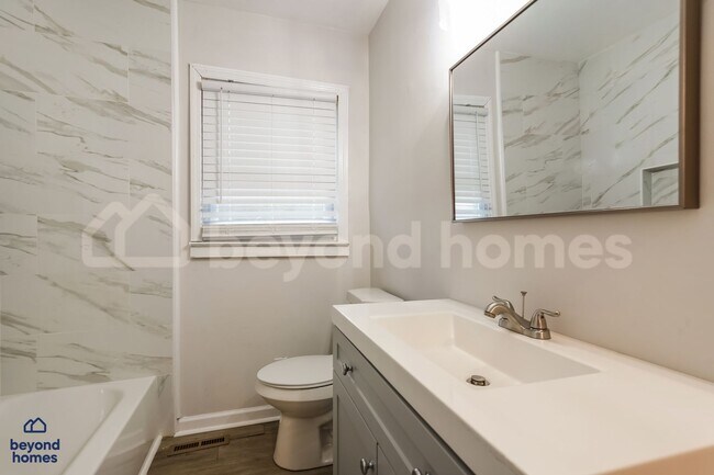 Building Photo - Updated Home with Fenced Yard + Bonus Room - Ready for Move-In Day!