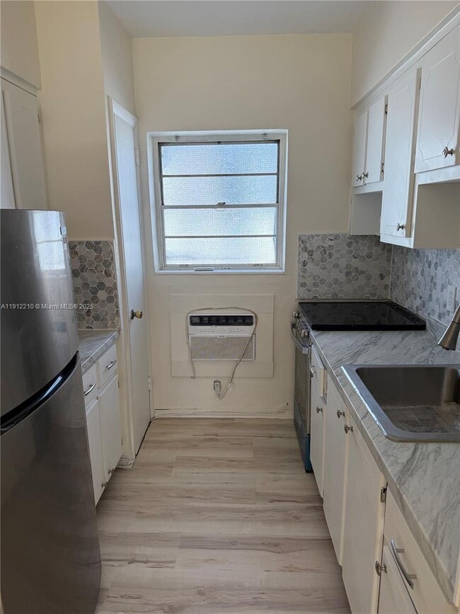 Building Photo - 8531 Harding Ave