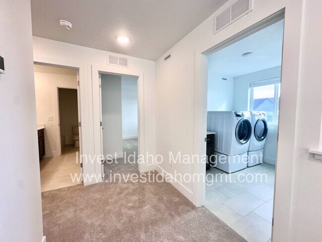 Building Photo - Spacious Luxury Townhome Designed for Modern Living available soon!