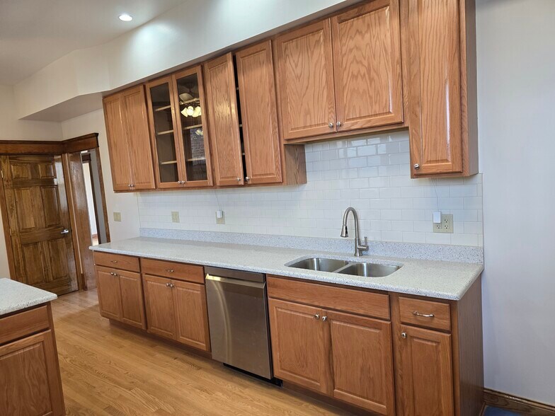 Kitchen with many cabinets & dishwasher - 1204 N Kedzie Ave