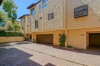 Building Photo - BRIGHT & AIRY, REAR-UNIT TOWNHOUSE W/ SPACIOUS PATIO, BALCONY & HUGE 2-CAR GARAGE IN GATED COMMUN...