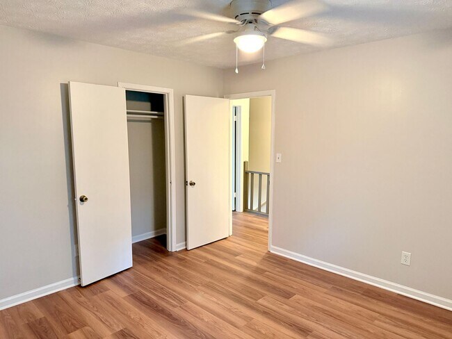 Building Photo - Welcome to this stylish and contemporary 2-bedroom, 1.5-bathroom corner townhome in Stockbridge!