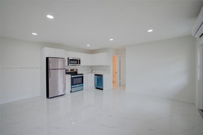 Building Photo - 1750 NE 56th Ct