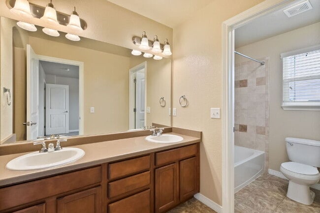 Building Photo - Spacious 3-Bedroom Home with Central A/C Near Fort Carson & Peterson