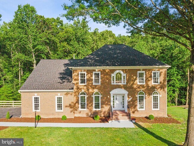 Building Photo - 10899 Woodland Falls Dr