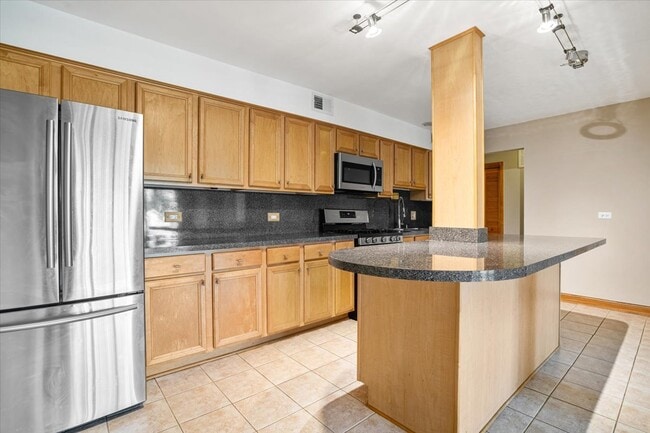 Building Photo - 5200 Carriage Way Dr