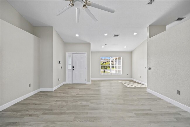 Building Photo - Beautifully remodeled home is situated in ...