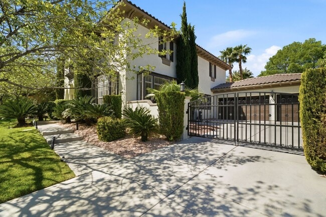 Building Photo - Private Gated Christopher Homes Estate in The Vineyards | Resort-Style Backyard & Strip Views