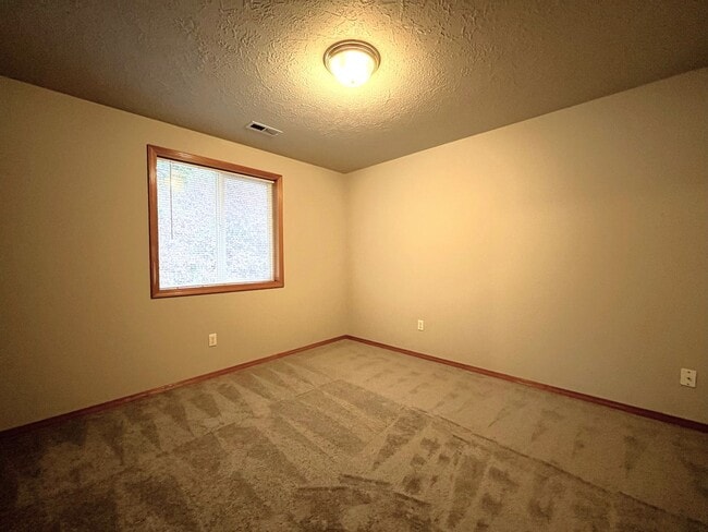 Building Photo - 3-Bed Home with Fireplace, Fenced Backyard, 2 Car Garage & Front Patio!