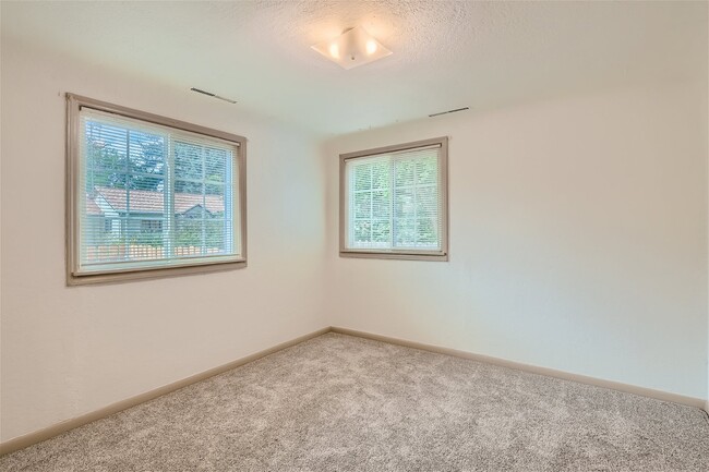 Front Bedroom with West and North facing windows - 1708 Aspen St