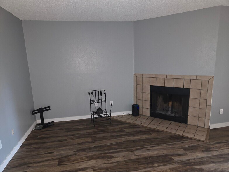 Common area w/Wood burning fireplace - 8910 Fox Dr